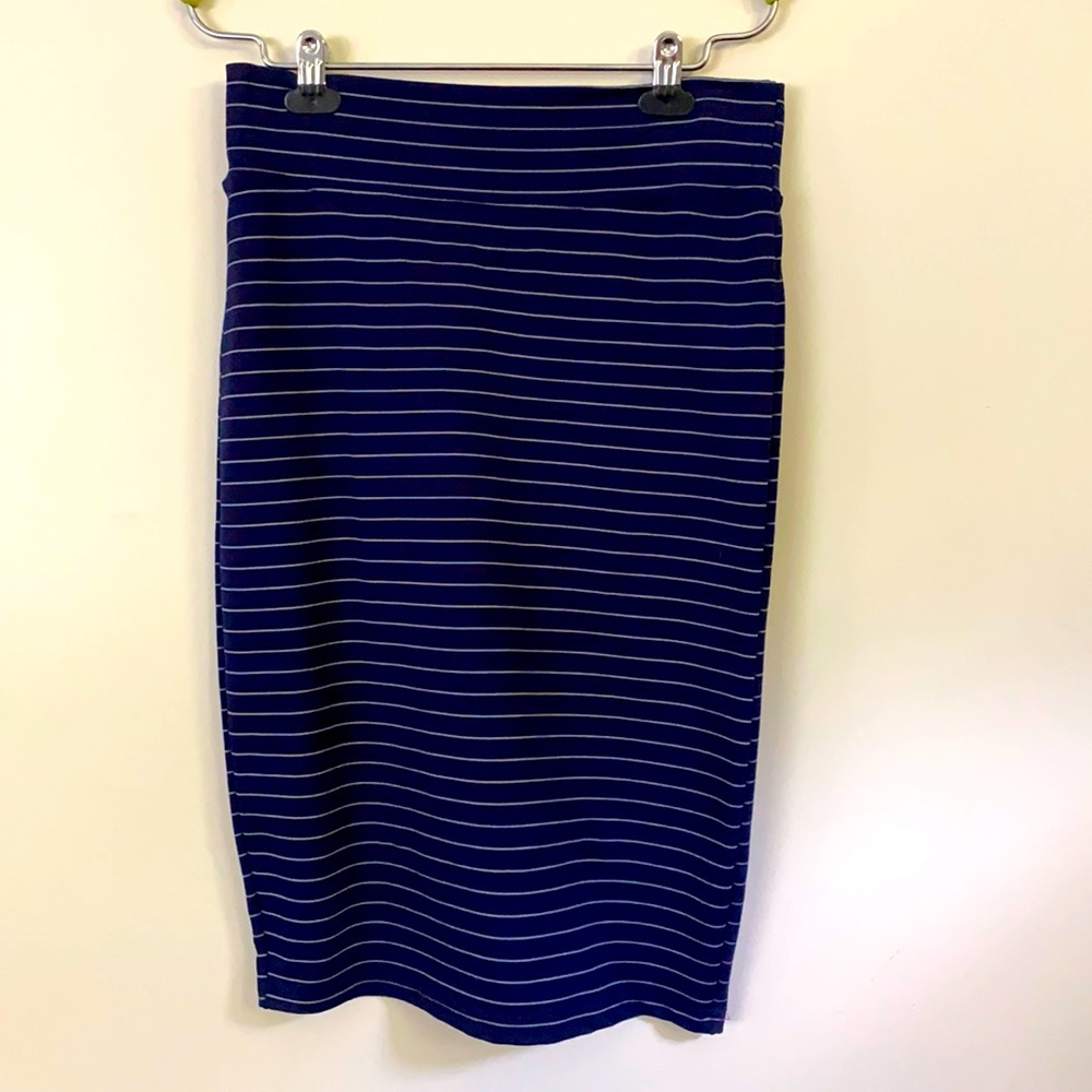 Skirt. Navy blue with white stripes.